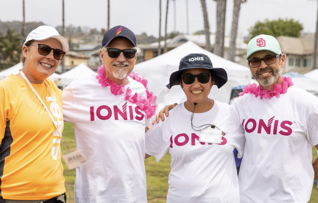 Ionis employees posing together at a company event. Ionis employees posing together at a company event.