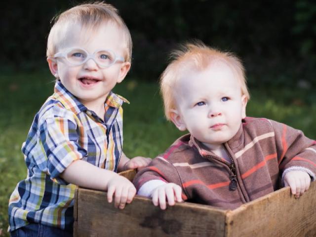 Two small children posing for a photo