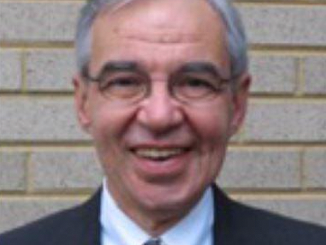 Headshot of Charles, Cardiologist