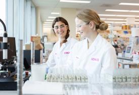 Two Scientists in a Lab