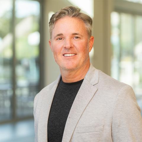 Headshot of Adrian Smith