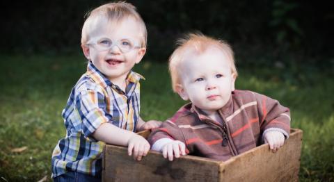 Two small children posing for a photo